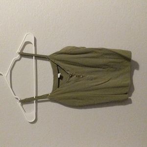 Small green tank with adjustable straps